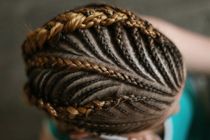 Birds eye view of someones head with braids