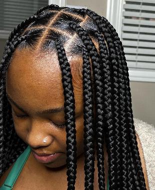 A girl with box braids